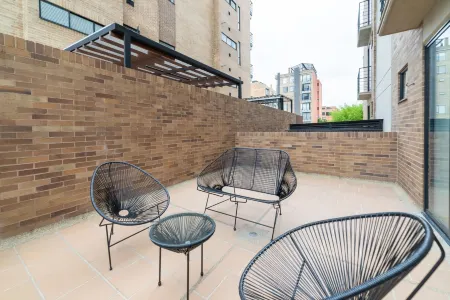 Capital by Wynwood House Отели рядом с достопримечательностью «Biblioteca Pública Virgilio Barco»