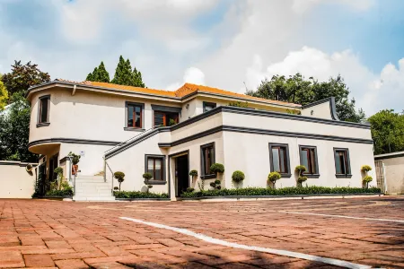 Gardenia Boutique Hotel Отели рядом с достопримечательностью «Ботанический сад Йоханнесбурга»