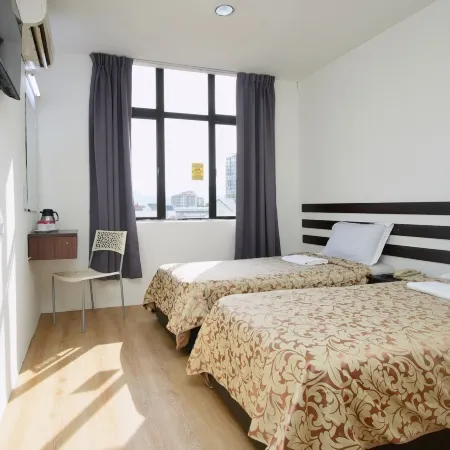 Grand Inn Hotel - Macalister Road Отели рядом с достопримечательностью «Особняк Саффолк-хаус»