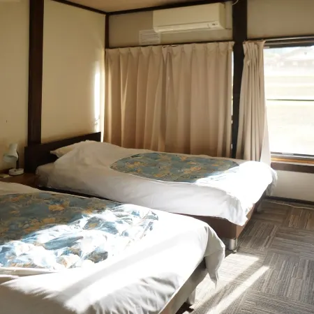 Sakura Guest House Отели рядом с достопримечательностью «Окухида Онсенго»