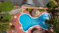 Mnarani Beach Cottages - piscina