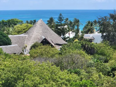 Diani Palm Resort and Apartments Hoteles en Tiwi