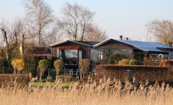 6 Pers. House Marijke with Winter Garden and Direct Access to the Lauwersmeer