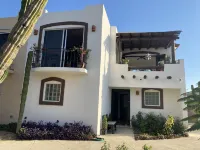 Private, charming  home 5 minutes from town, beach and shopping