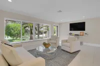 Steps from the beach, heated pool, and ocean sunrises from your patio