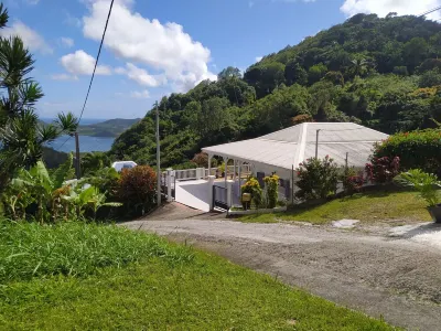 MIGALINE. Creole villa with breathtaking views of the Caribbean Sea Hotels near An Mao