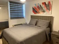 Your Cozy Combate beach retreat, 2 bed/2bath, full A/C, free laundry