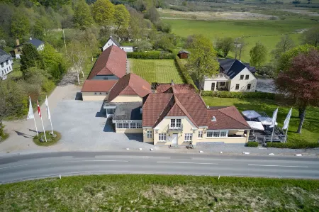 Skovdal Kro Отели в г. Еллинг