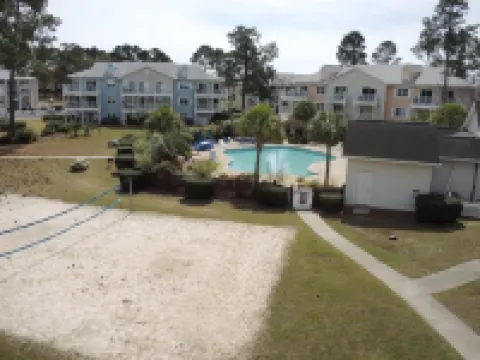 Pool View Unit 1509 at Brunswick Plantation Feature 27 Hole Golf Course Onsite by Redawning Hotels in Calabash