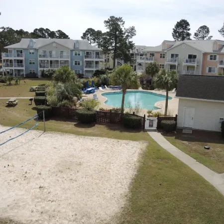 Pool View Unit 1509 at Brunswick Plantation Feature 27 Hole Golf Course Onsite by Redawning