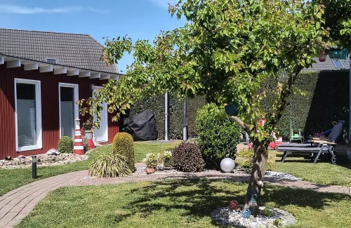 FH with Garden, Playground, Sauna, Fitness, 2 Bedrooms, Kitchen with Dishwasher Hotels in Ludorf