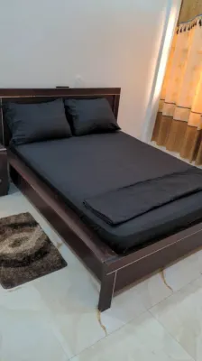 Charming 2-bedroom apartment with AC, WiFi along with security agent in Lome.