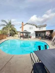 Tranquil Escape: 4-Bedroom Home with Modern Amenities and pool