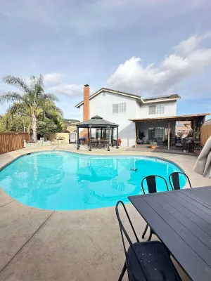 Tranquil Escape: 4-Bedroom Home with Modern Amenities and pool