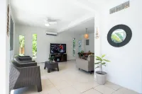 Family-sized entire house with private pool. 10 minutes to a black sand beach!