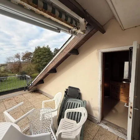 Apartment with beautiful view over a wooded park and a large terrace