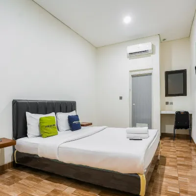 Urbanview Hotel Aloevera Pontianak Отели рядом с достопримечательностью «Музей орангутанов»
