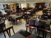 Plaza Praia Suítes - servizio colazione