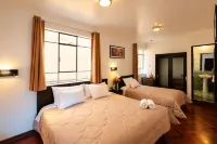 Hostal & Apartments El Triunfo - Homestays