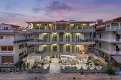 Ouzas Luxury Hotel Hotels near Olympic Beach