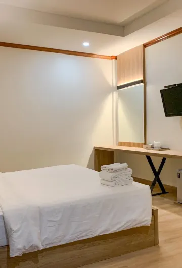 ห้องดีลักซ์ เตียงใหญ่ พร้อมวิวสวน