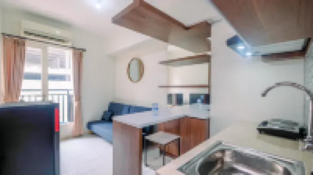 Cozy Stay 2BR Podomoro Golf View Apartment By Travelio Hotels in Gunung Putri