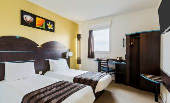 a modern hotel room with two beds , a desk , and a window , decorated with yellow walls and white bedding at Sure Hotel by Best Western St-Amand-Les-Eaux