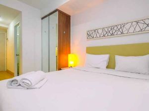 Modern Style Studio Apartment at Azalea Suites with City View By Travelio