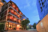 Phongsavath Boutique Hotel Hotels near ຖະໜົນສາມແສນໄທ