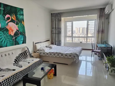 Dan Jie Chengxin Short-term Apartment (Zhanqian Street) Отели рядом с достопримечательностью «Kuixing Building»