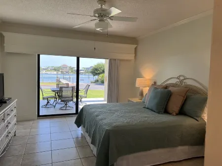 Ground floor condo with walk out access to docks, fishing piers and pool