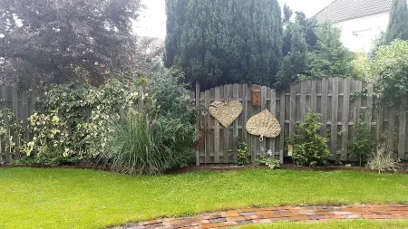 Ferienwohnung Wesergarten Отели в г. Норденхам