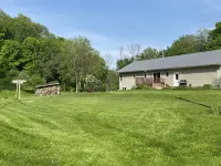 Private vacation house for larger groups near the Dells with heated game room.