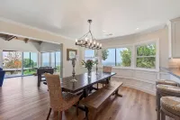 A private oasis to relax and play in the comfort of a gated 2-acre estate.