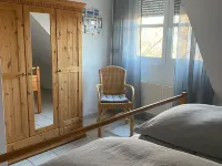 Comfortable holiday center house with its own garden directly at the nature reserve Hotels in Borkum