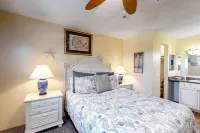 Cozy Beach Condo with Private Beach, heated pool, hot tub, and More.