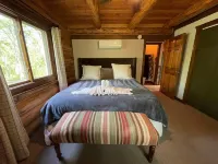 Beautiful Log Cabin Retreat on 6 Acres of Forest Only 10 Minutes to Lake Geneva.