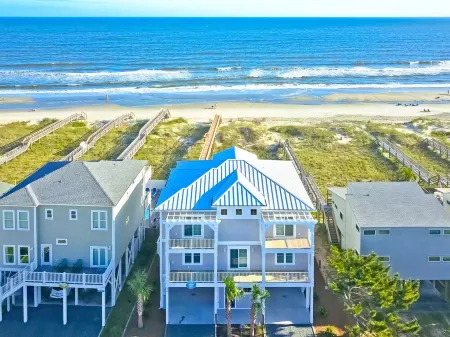 Beautiful new Custom Oceanfront home with XL covered decks, pool and elevator.