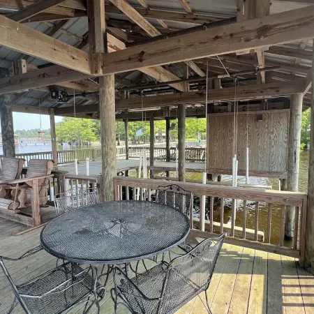 Slice of Heaven 3/2 camp on lakefront w/ boathouse