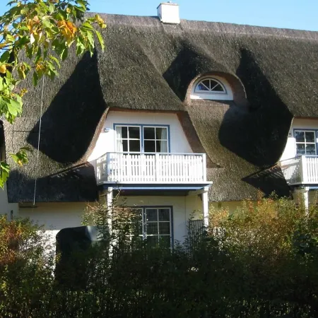 Apartment with a sophisticated atmosphere behind the dike directly on the beach Отели в г. Цингст