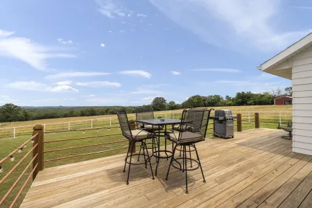 Lake view house with expansive views, fireplace, walk in showers, Ember mugs.