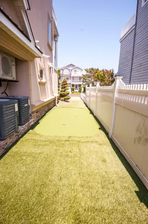 Seaside Beach Mansion w/9 Bedrooms, 8 Full Baths, Pool, Elevator & Rooftop Deck.