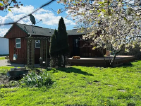 Located Behind a Tree Filled Garden Near Our Horse Barn and Farm Sanctuary.