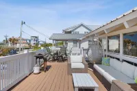 Beach Retreat w/ Sundeck, Golf Cart & Bikes Bungalow House by Avantstay