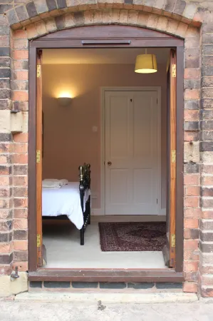 Holly Lodge Country Guest House Отели в г. Окстон