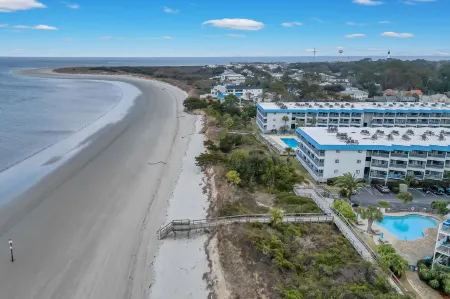 Private Balcony and Pool Access - Charming Ocean-View Getaway