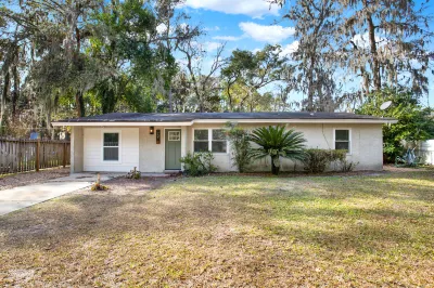 Spacious Backyard and Convenient Access - Charming Serene Retreat Hotels near Steeplechase Playground