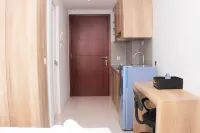 Nice and Cozy Studio at Tamansari Mahogany Karawang Apartment