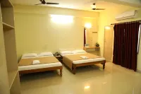 Ganesh Beach Resort فنادق في Manjakuppam