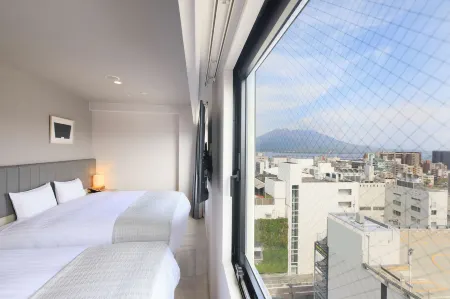 Quintessa Hotel Kagoshima Tenmonkan Relax&Sleep Отели рядом с достопримечательностью «Shiroyama Park Observation Deck»